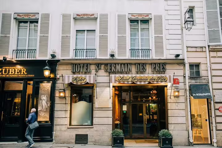 Hotel Saint Germain des Prés facade with classic Parisian architecture and ornate entrance in Paris