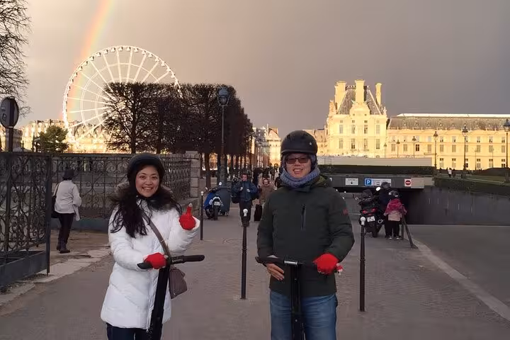 Paris Segway night highlights small group tour near the Louvre and Tuileries, with Ferris wheel and rainbow