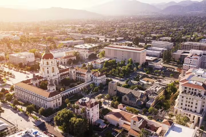 Aerial view of Pasadena City Hall and downtown district with San Gabriel Mountains backdrop