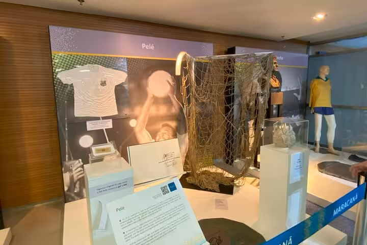 Pelé memorabilia display inside Maracanã Stadium museum, highlight stop on Rio de Janeiro stadium tour with local
