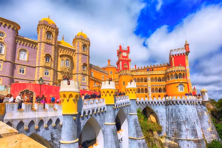 Vibrant Pena Palace in Sintra with stunning architecture, a highlight on the small group tour from Cascais to Cabo Roca.