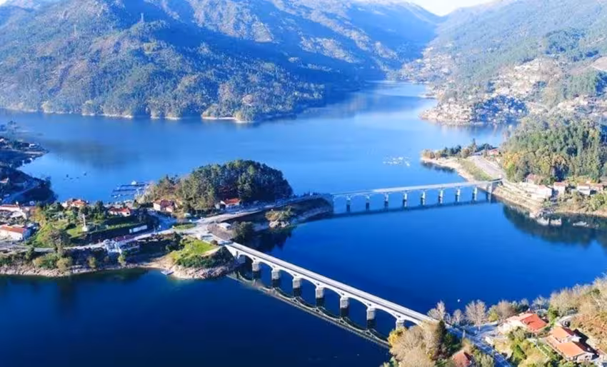 Aerial view of Peneda Geres National Park with stunning lake and bridge scenery, ideal for a 3-day private tour adventure.