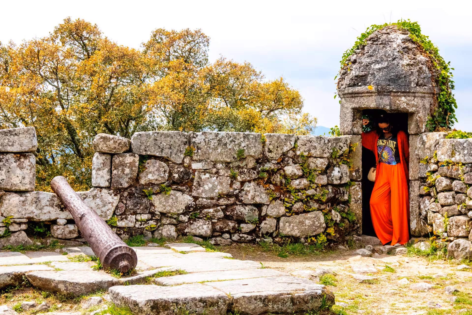 Historic stone fort with lush vegetation in Peneda Geres National Park, ideal for a 3-day private tour exploration.