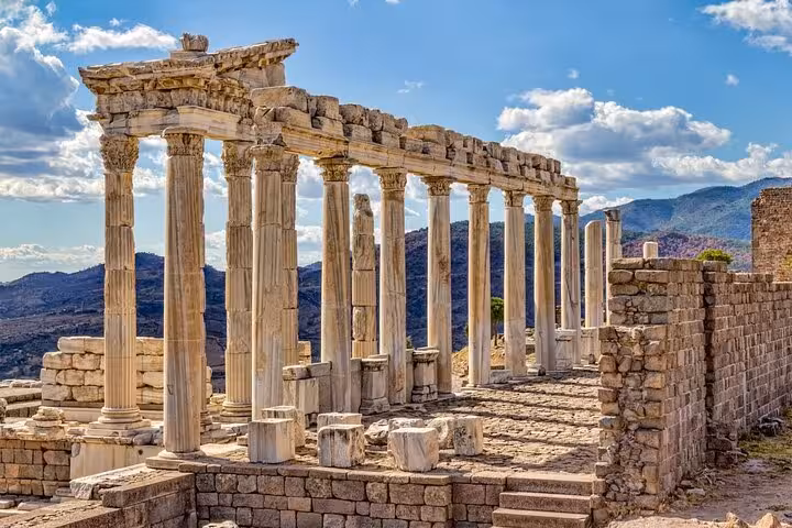 Pergamon Acropolis colonnade ruins overlooking mountains, featured on the 4 Days 7 Churches of Revelation tour