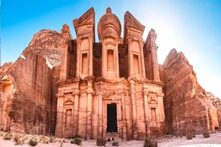 Sunlit Petra Monastery facade in Wadi Musa, Jordan excursion on 8-day Marsa Alam Luxor Cairo tour