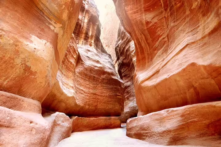 Narrow Siq canyon in Petra, Jordan, on a full-day tour from Sharm El Sheikh with guided sightseeing