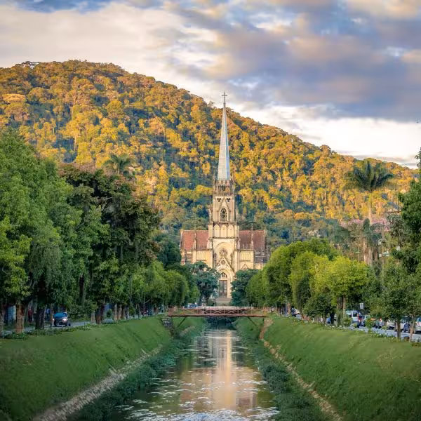 Picturesque view of the Cathedral of Saint Peter of Alcantara framed by lush hills in Petrópolis, Brazil, on a private tour.