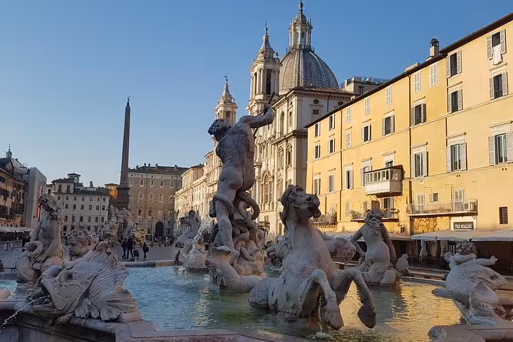 Piazza Navona Fountain of the Four Rivers in Rome, iconic landmark on 8-day private tour of Tuscany and Italy