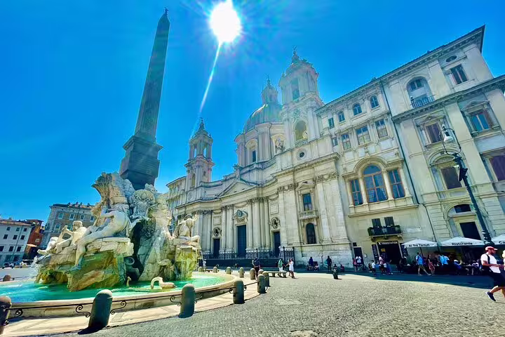 Piazza Navona with Fountain of the Four Rivers and Baroque church on Rome and Vatican City shore excursion from Civitavecchia