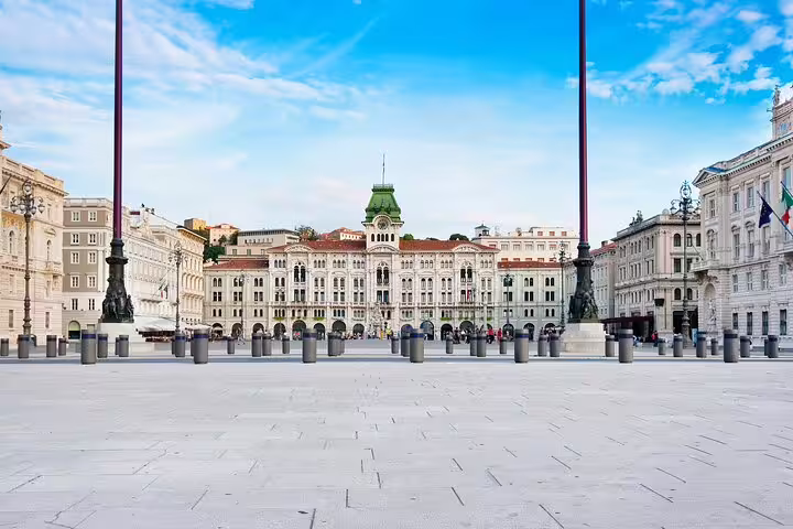Piazza Unità d’Italia in Trieste with grand Habsburg palaces and wide seafront square on a hidden gems private walking tour