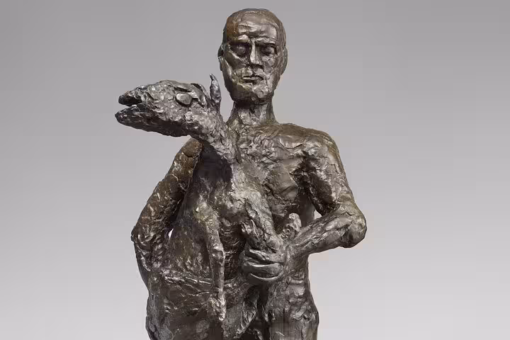 Bronze sculpture of a nude figure holding an animal at Picasso Museum Paris on a 2-hour private guided tour