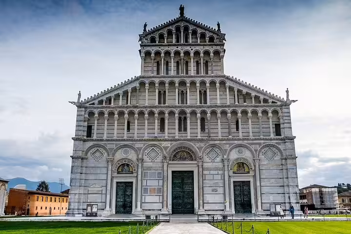 Facade of Pisa Cathedral in Piazza dei Miracoli, a highlight on a day trip from Rome to Pisa tour