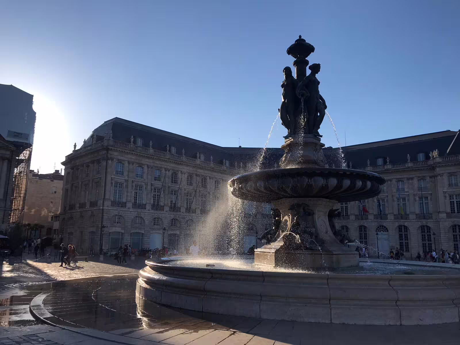 Fountain at Place de la Bourse on a Bordeaux walking tour, iconic landmark stop before a natural Bordeaux wine glass