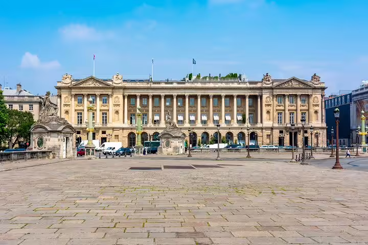 Place de la Concorde with Hôtel de la Marine neoclassical facade in Paris on a sunny day