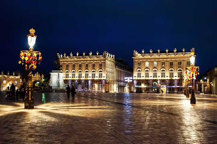 Illuminated Place Stanislas at night in Nancy, perfect stop on an e-scavenger hunt city exploration tour
