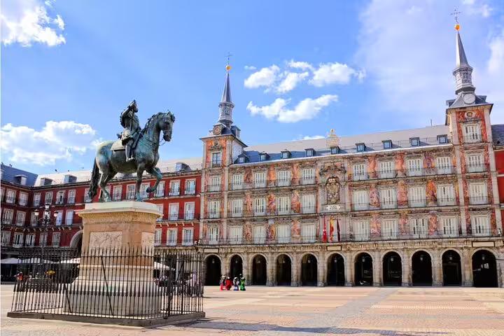 Plaza Mayor Madrid with equestrian statue of King Philip III and ornate baroque facade