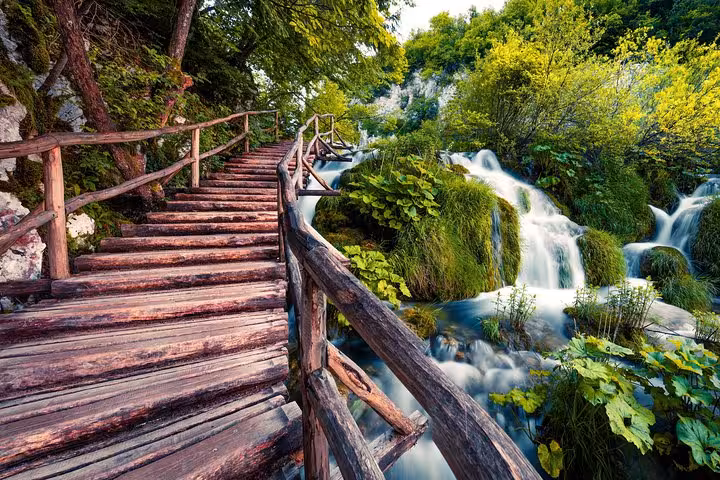Wooden boardwalk beside Plitvice Lakes waterfalls, Croatia, on Dubrovnik–Mostar–Split–Zagreb 3-day tour