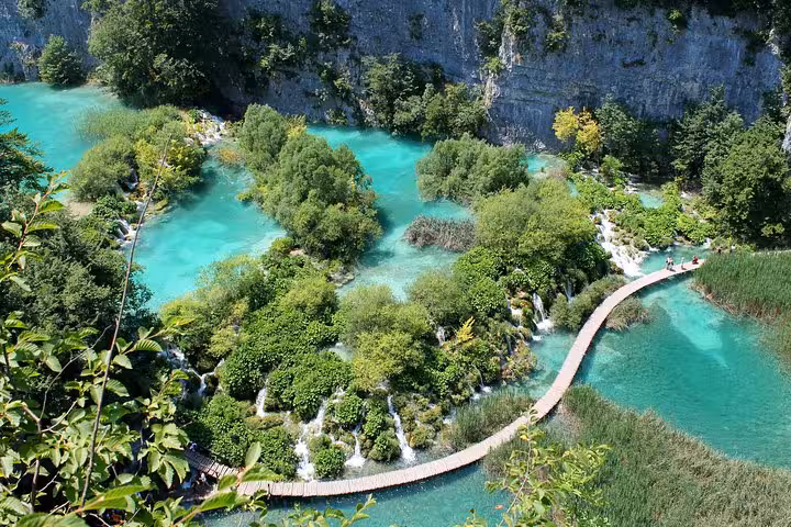 Plitvice Lakes boardwalk over turquoise waterfalls, highlight of 3-day Dubrovnik to Zagreb tour