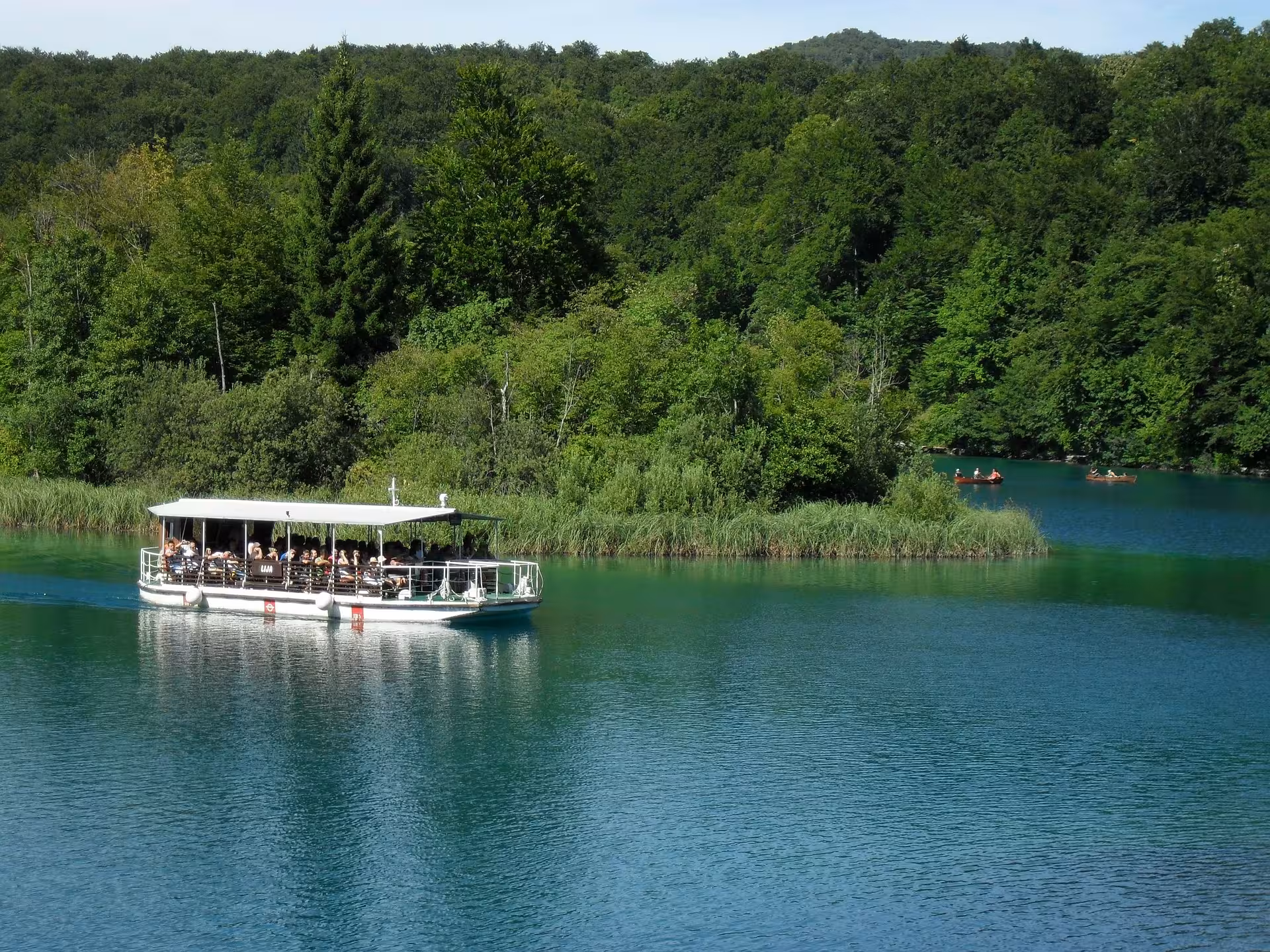 Electric boat cruise on Plitvice Lakes National Park, a popular full-day guided tour from Split, Croatia