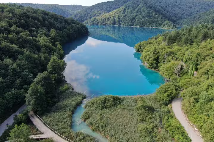 Veliki Slap waterfall and emerald pools in Plitvice Lakes National Park, Croatia admission ticket view