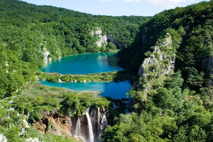 Panoramic Plitvice Lakes National Park turquoise lakes and waterfalls, highlight of private day trip from Zagreb