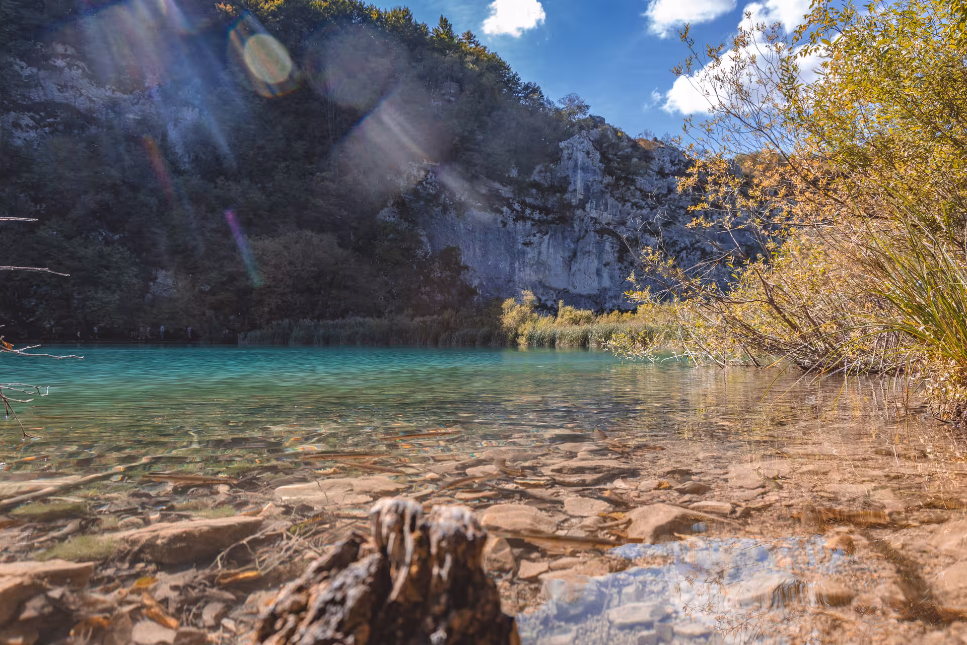 Crystal-clear turquoise lake and limestone cliffs at Plitvice Lakes, hidden gem day trip from Zagreb