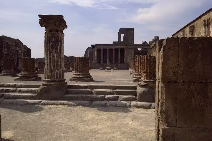 Discover the grandeur of Pompeii's ancient columns and temples, accessible with our skip-the-line tour from Amalfi.