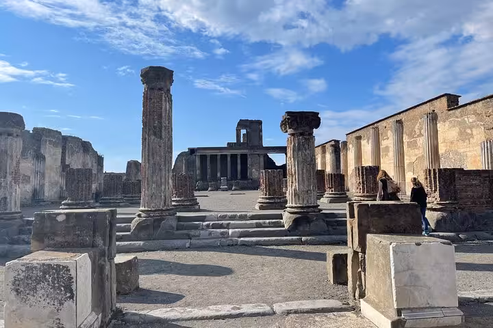 Discover the majestic ruins of Pompeii's Forum on a skip-the-line small group guided tour.