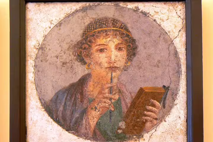 Pompeii fresco portrait in archaeological site museum, highlight of Naples to Pompeii half day group tour