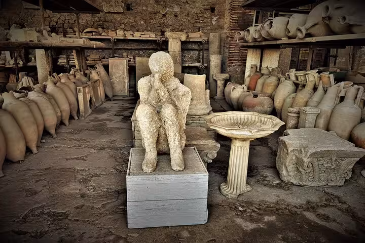 Discover preserved artifacts and casts at Pompeii's archaeological site on a guided tour from Sorrento Coast.