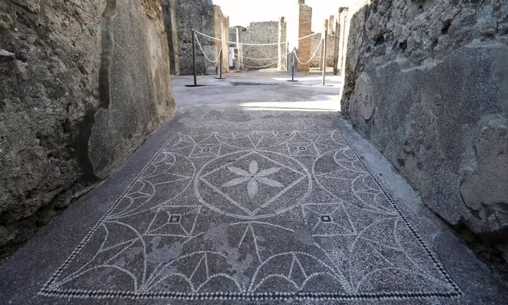 Geometric Roman mosaic floor in Pompeii alley, budget Pompeii tour from Naples with Amalfi option