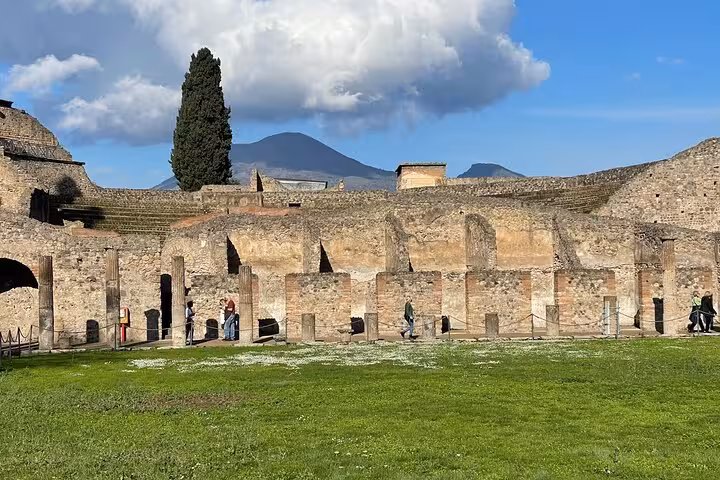 Visit the impressive ruins of Pompeii with a stunning view of Mount Vesuvius on a small group tour from Sorrento.