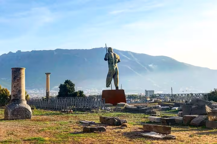 Marvel at Pompeii’s iconic statue and ruins with Mount Vesuvius as a backdrop on a Sorrento Coast guided tour.