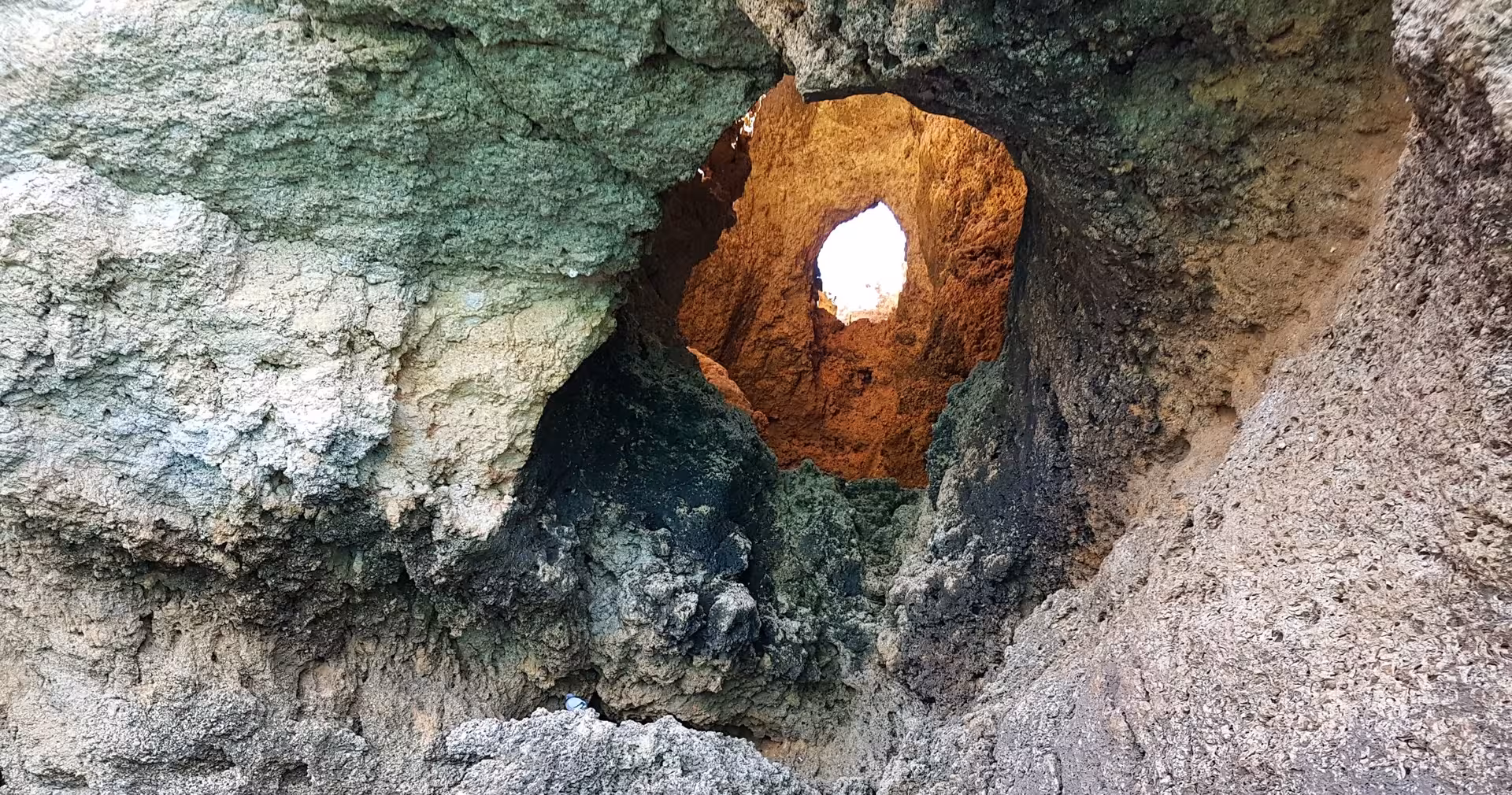 Close-up of rugged sea cave rock formations at Ponta da Piedade, Lagos, seen on a coastal boat trip in the Algarve