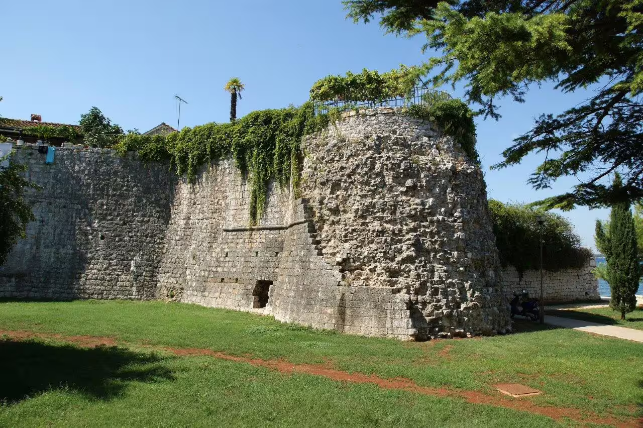 Stone fortification walls in Porec, Istria, Croatia on an 8-day self-drive tour through Istria and Dalmatia
