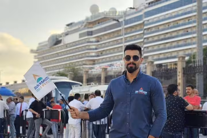 Port Said cruise terminal tour guide welcomes guests for Cairo day trip to Pyramids, Citadel and Khan el-Khalili