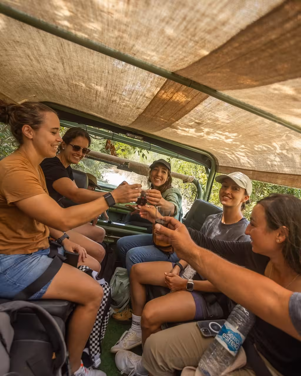 Guests toast with port wine during a Douro Valley day tour from Porto, small-group adventure in Gaia