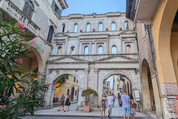 Porta Borsari arch in Verona historic center, key stop on Verona walking tour with live guide in Italy