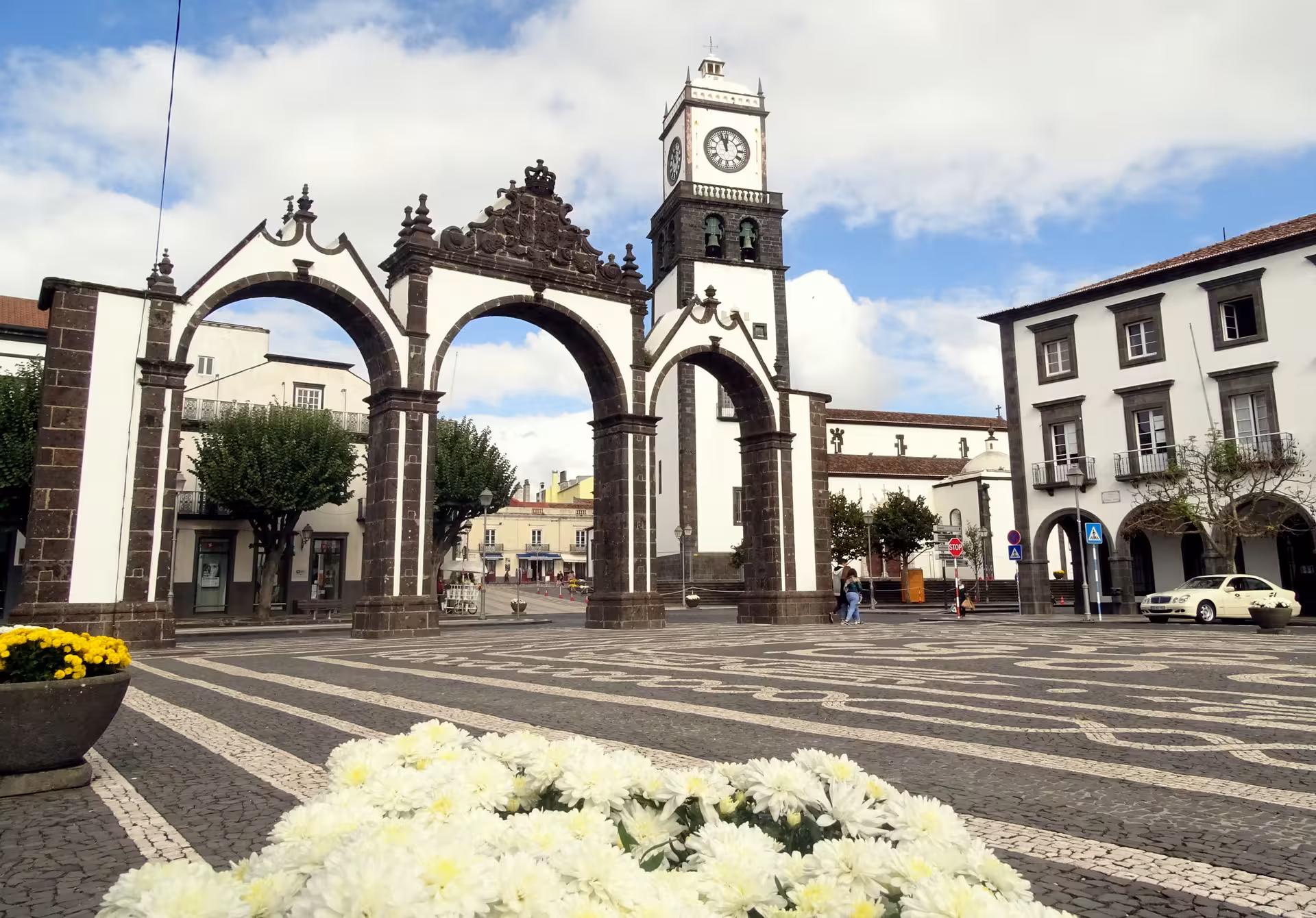 Portas da Cidade arches and clock tower in Ponta Delgada, a highlight of the half-day walking tour in Azores