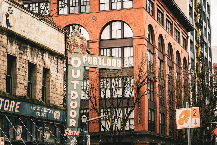 Portland Outdoor Store vintage neon sign on brick building in downtown Portland, Oregon