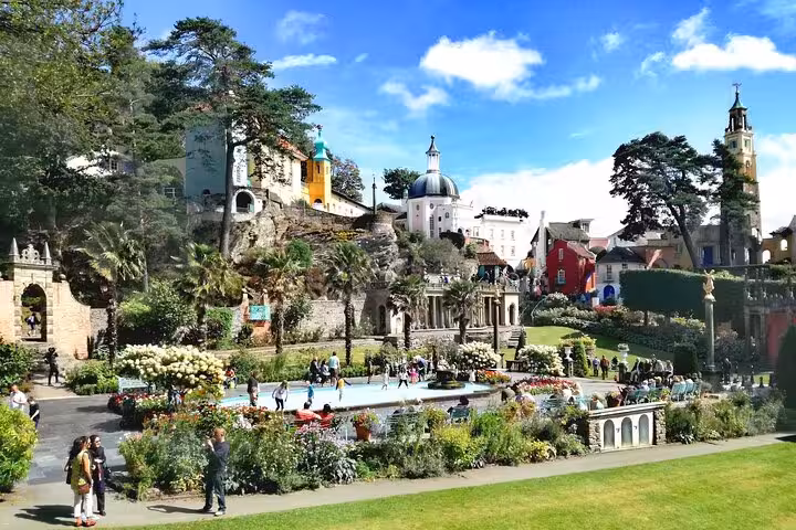 Portmeirion village gardens and colourful Italianate buildings, key stop on Portmeirion Castles and Snowdonia tour