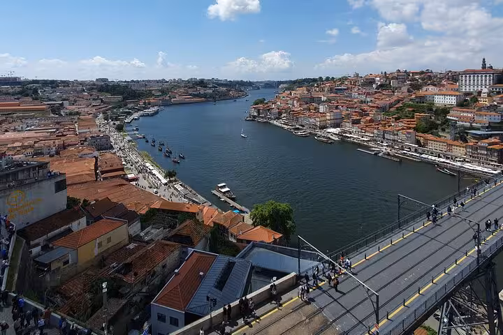 Enjoy panoramic views of Porto's Douro River and cityscape on a private city hall walking tour experience.