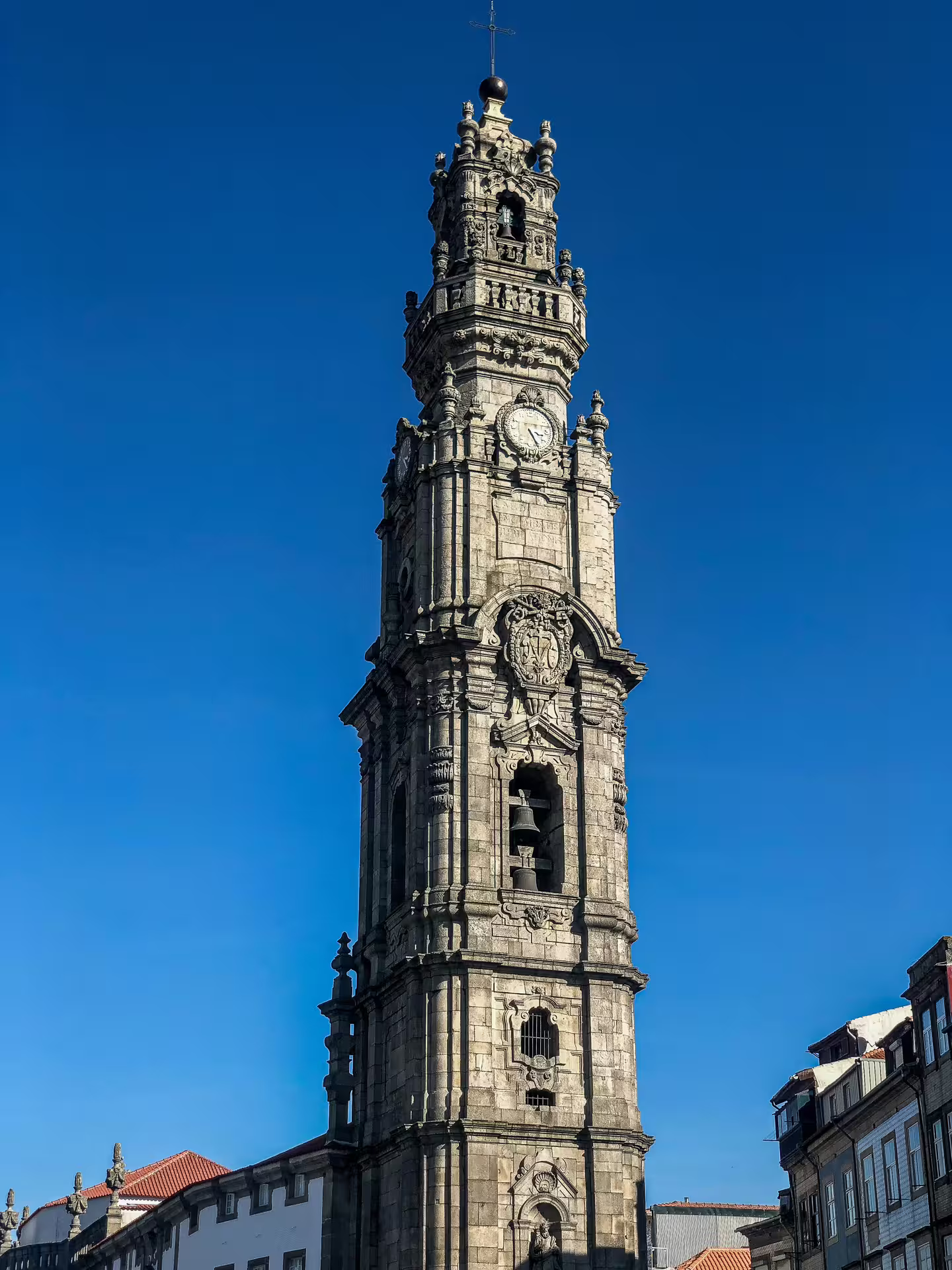 Explore Porto's iconic Clerigos Tower on a guided tuk tuk tour, capturing stunning architecture and vibrant city views.