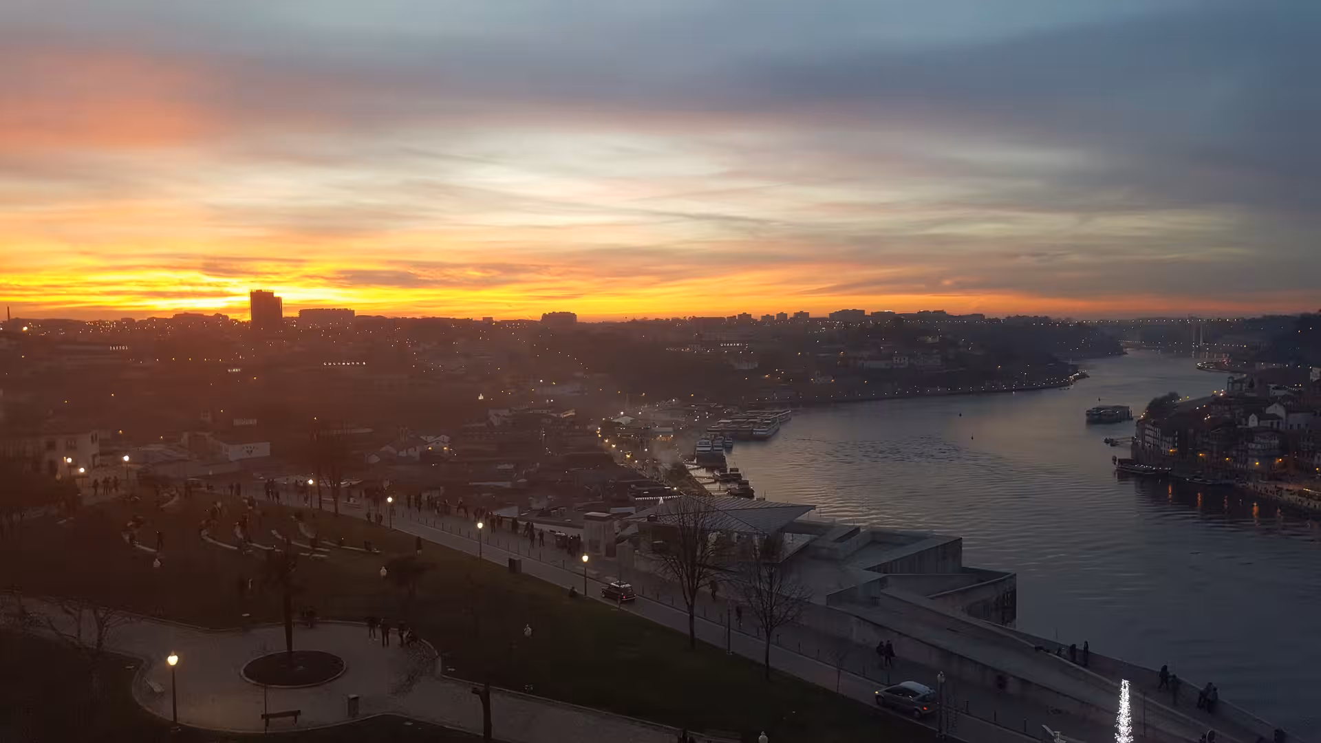 Sunset over Porto and Douro River, panoramic view ideal for private half-day Porto tour with boat trip