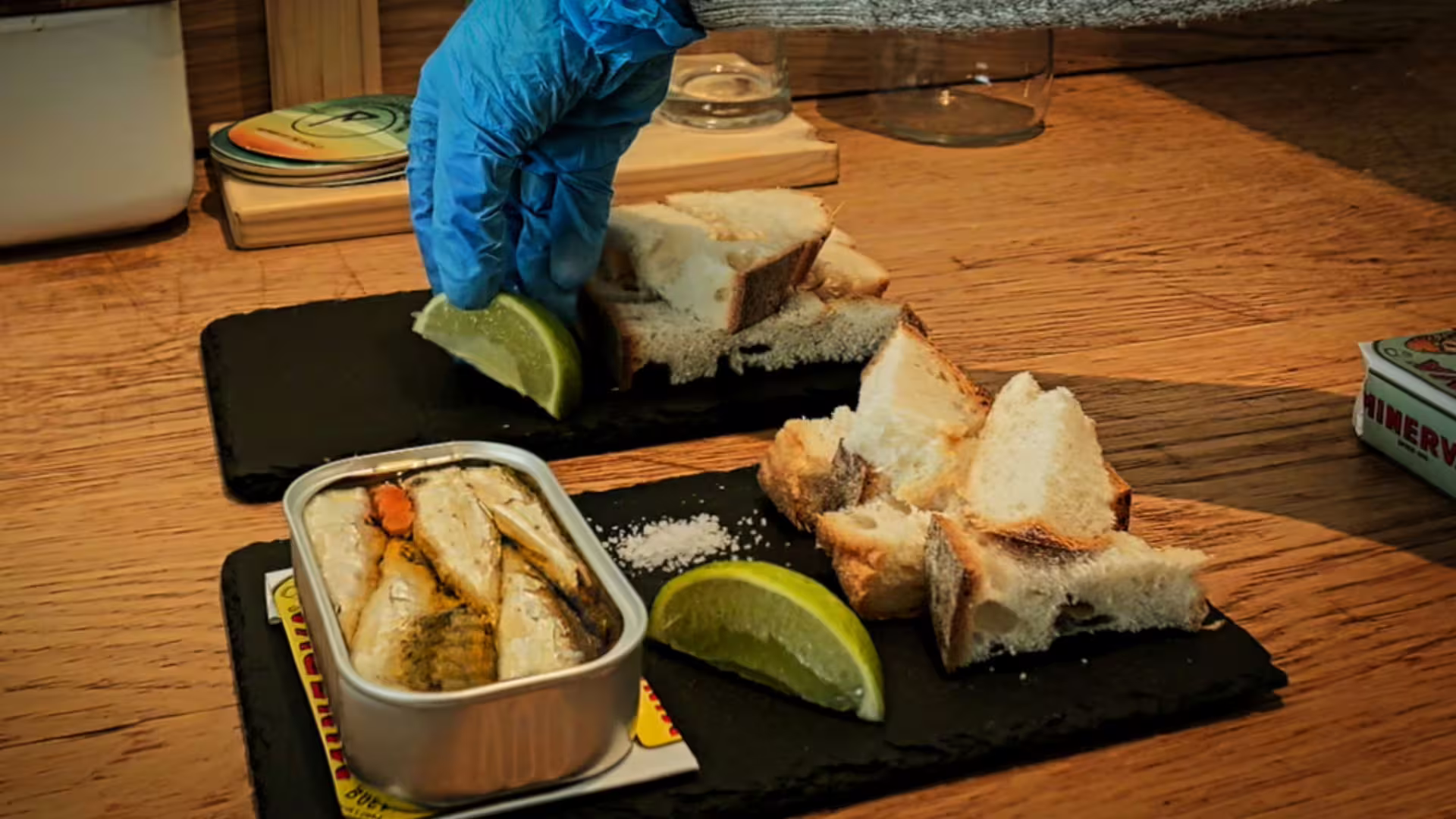 "Board with bread and premium canned fish, part of Cooltour Oporto's Porto Food Tour Canned Fish Tasting