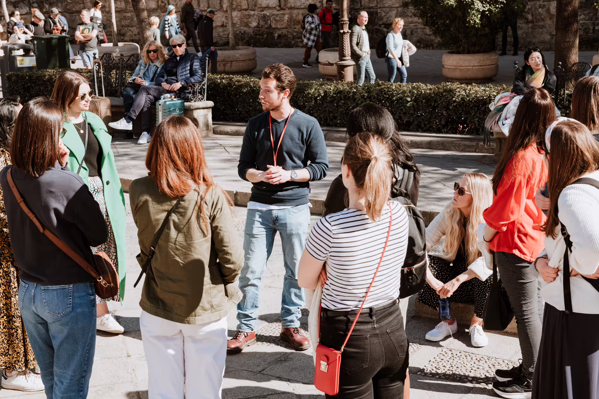 Tour group gathers in sunny Porto for a guided walking tour along Douro's picturesque riversides in Porto and Gaia.