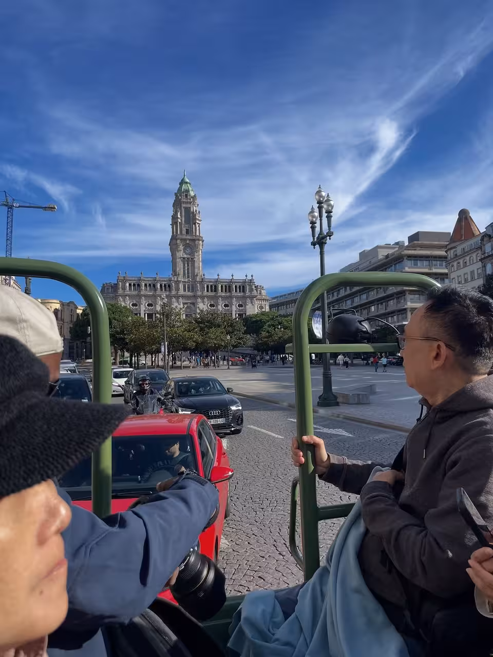 Open-top Porto sightseeing tour passing Porto City Hall on the Porto, Gaia and Douro experience