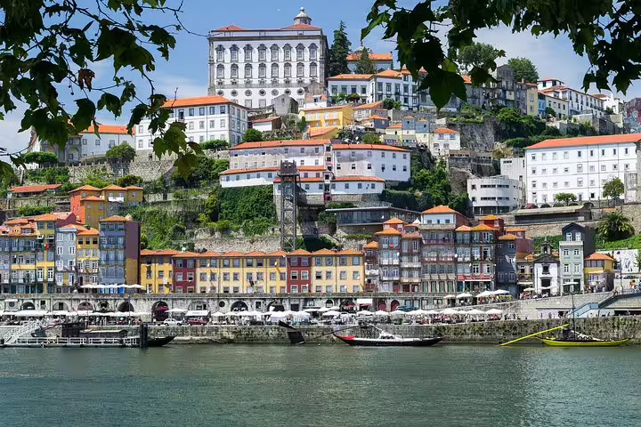 Scenic view of Porto's colorful Ribeira district along the Douro River, featured in the Essential Porto Walking Tour.