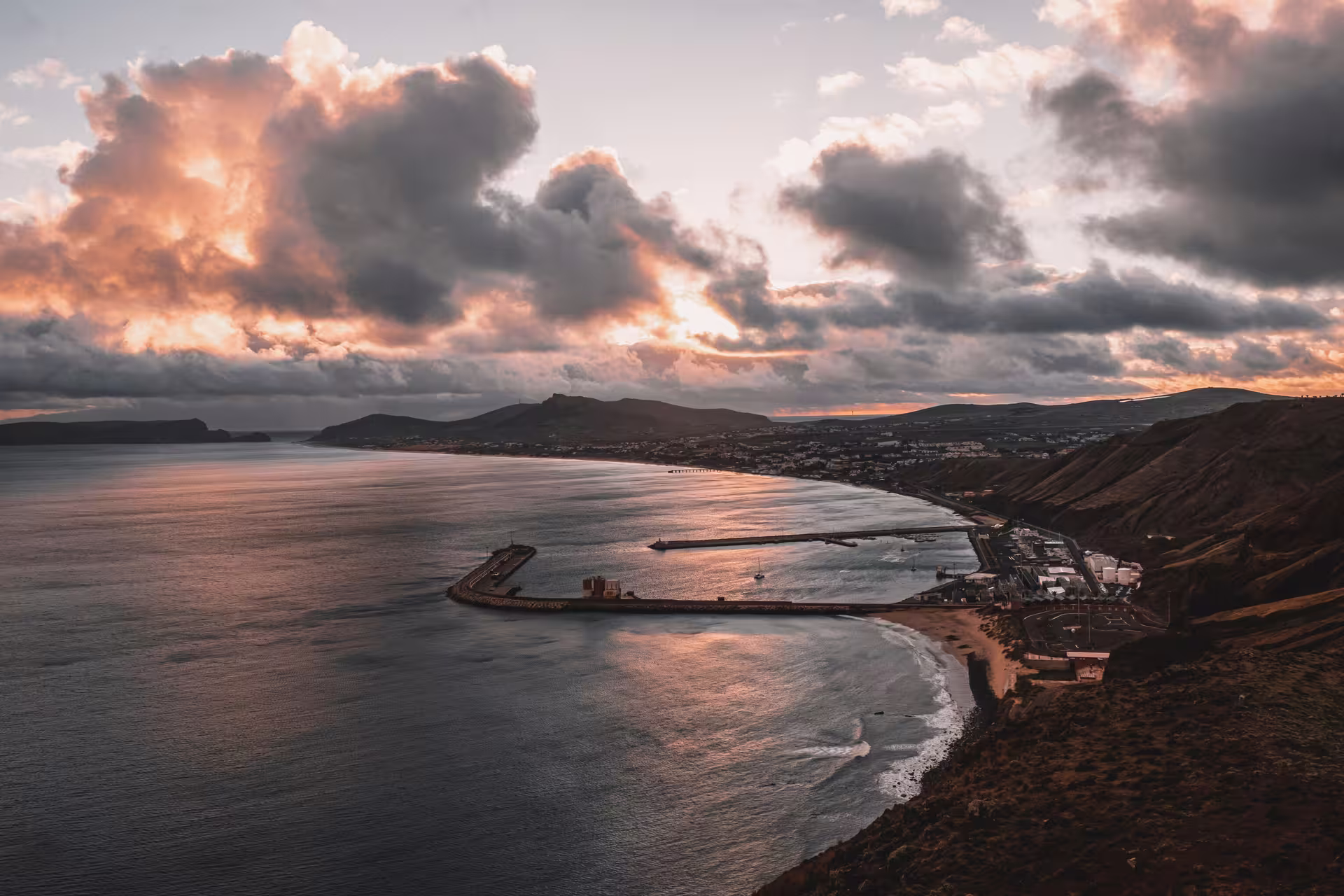 Stunning sunset over Porto Santo's coastline, highlighting the island's natural beauty for the Ocean Seeker tour.