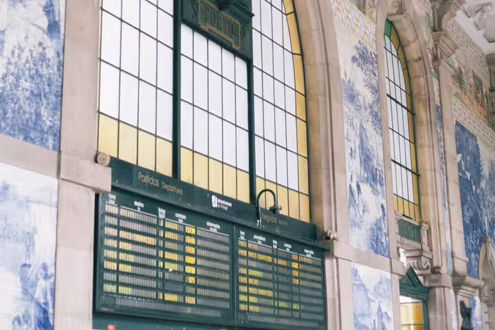 Explore Porto's iconic São Bento Railway Station with its stunning azulejo tiles on a half-day private tuk-tuk tour.